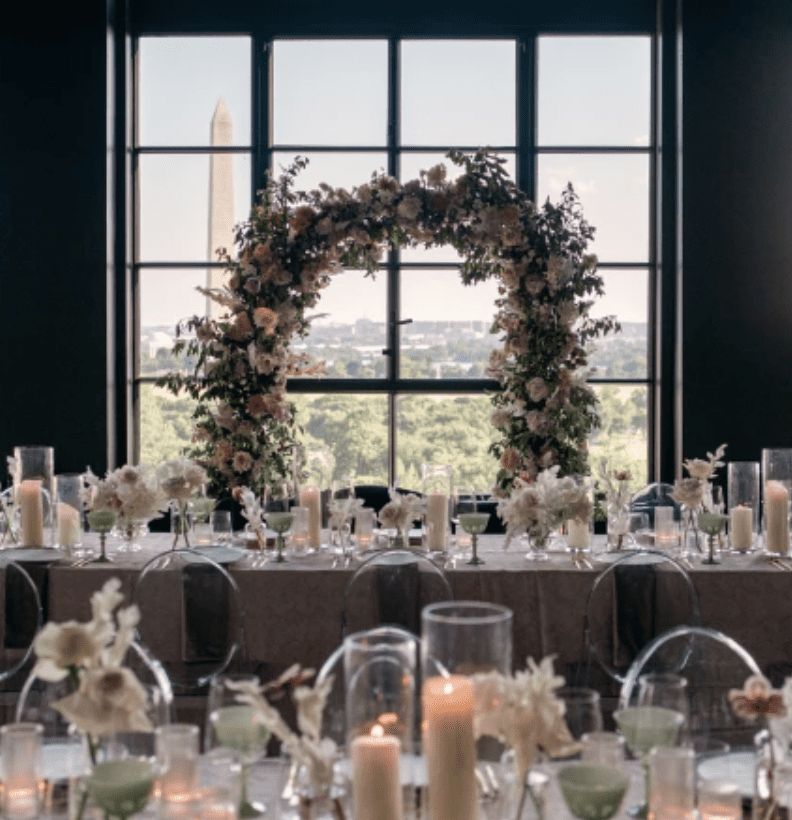 A stylish wedding at Hotel Washington featuring modern interiors and rooftop views of the city